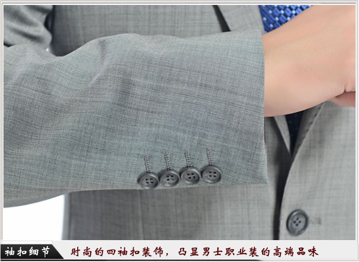 灰色平駁頭一?？勐殬I(yè)裝定制-袖口細(xì)節(jié)展示，時(shí)尚的西袖扣裝飾